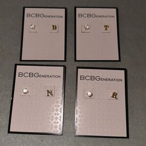 #24 assorted initial studs